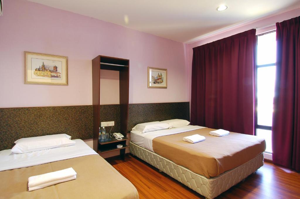 Aristo Hotel Putatan Кота-Кінабалу Номер фото
